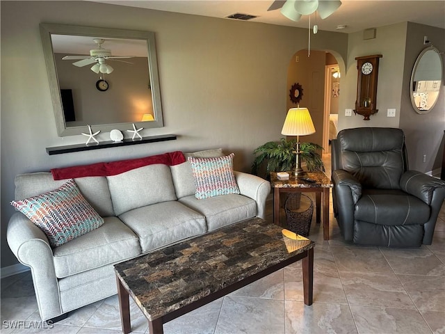 11460 Caravel Cir Unit 5009, Fort Myers, FL 33908 - living room featuring a ceiling fan and arched walkways
