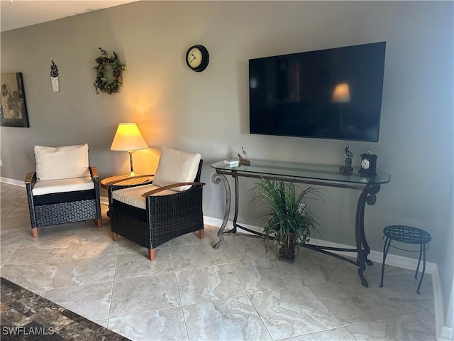 11460 Caravel Cir Unit 5009, Fort Myers, FL 33908 - sitting room featuring baseboards
