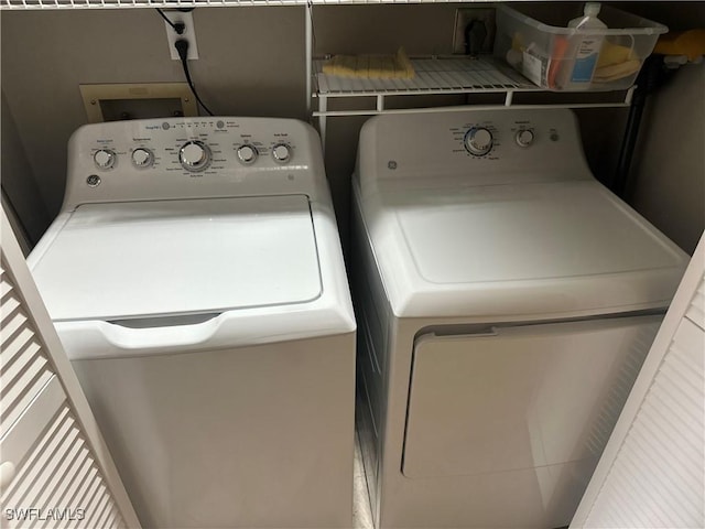11460 Caravel Cir Unit 5009, Fort Myers, FL 33908 - laundry room featuring washer and dryer