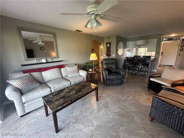 11460 Caravel Cir Unit 5009, Fort Myers, FL 33908 - living area featuring arched walkways and ceiling fan