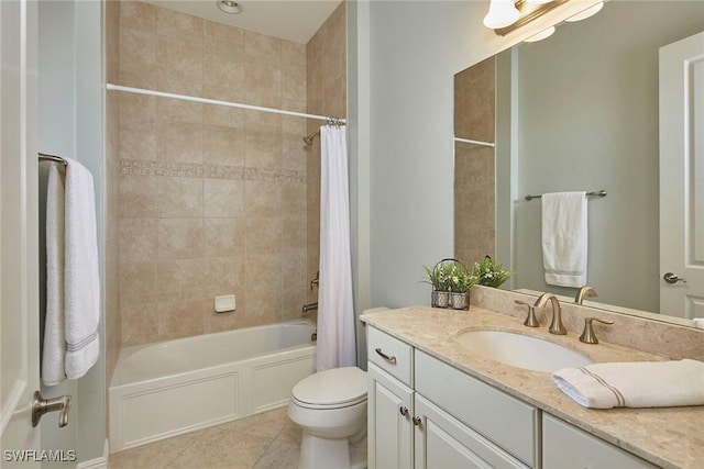 4551 Tamarind Way, Naples, FL 34119 - full bathroom featuring tile patterned floors, vanity, shower / bath combo with shower curtain, and toilet