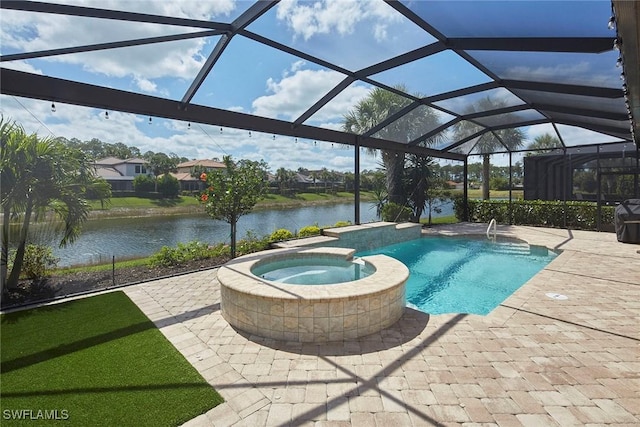 4551 Tamarind Way, Naples, FL 34119 - view of pool featuring a water view, a patio, a pool with connected hot tub, and a lanai