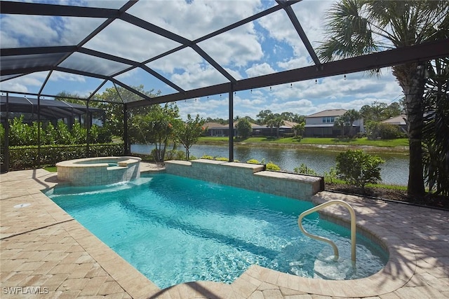 4551 Tamarind Way, Naples, FL 34119 - view of swimming pool featuring a water view, a pool with connected hot tub, a patio, and a lanai