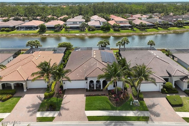 4551 Tamarind Way, Naples, FL 34119 - aerial perspective of suburban area with a large body of water