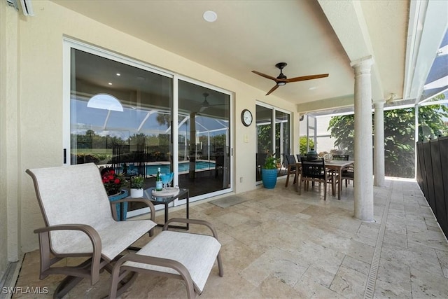171 Via Napoli, Naples, FL 34105 - view of patio with ceiling fan, a lanai, and outdoor dining space