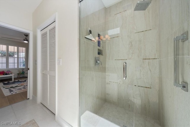 171 Via Napoli, Naples, FL 34105 - full bathroom featuring a marble finish shower, a ceiling fan, and tile patterned flooring