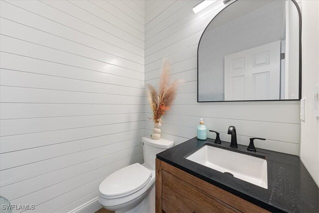 171 Via Napoli, Naples, FL 34105 - half bath featuring vanity and toilet