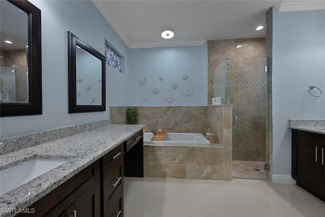 3460 4th Ave NE, Naples, FL 34120 - bathroom with vanity, crown molding, a garden tub, a shower stall, and tile patterned flooring