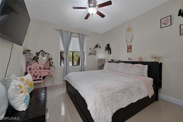 3460 4th Ave NE, Naples, FL 34120 - bedroom featuring baseboards, ceiling fan, and light tile patterned floors
