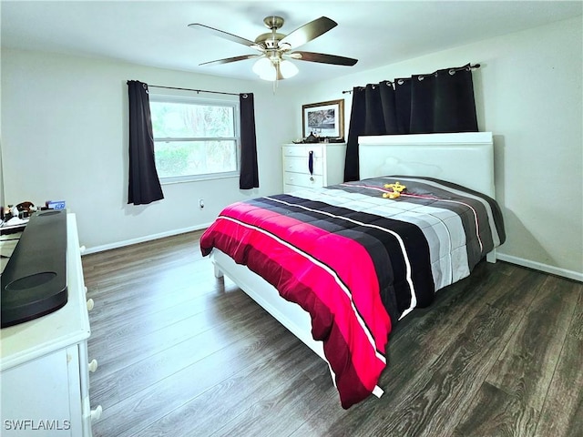 4268 25th Ave SW, Naples, FL 34116 - bedroom with wood finished floors, baseboards, and a ceiling fan