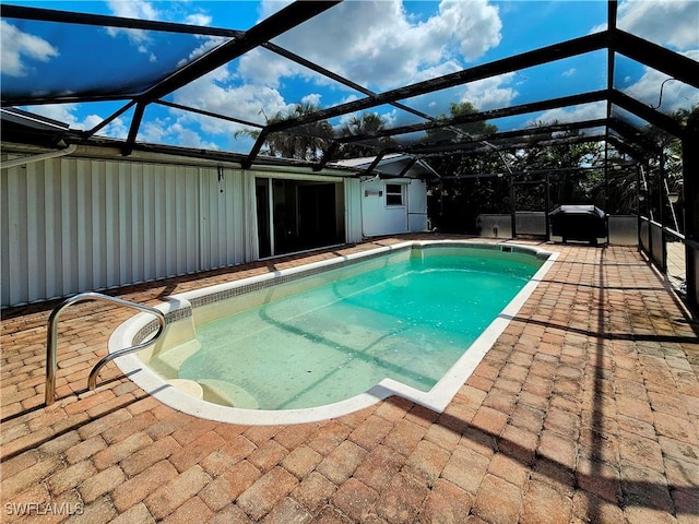4268 25th Ave SW, Naples, FL 34116 - outdoor pool featuring a patio area and glass enclosure