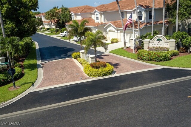 15055 Tamarind Cay Ct Unit 1205, Fort Myers, FL 33908 - view of asphalt road with a residential view and curbs