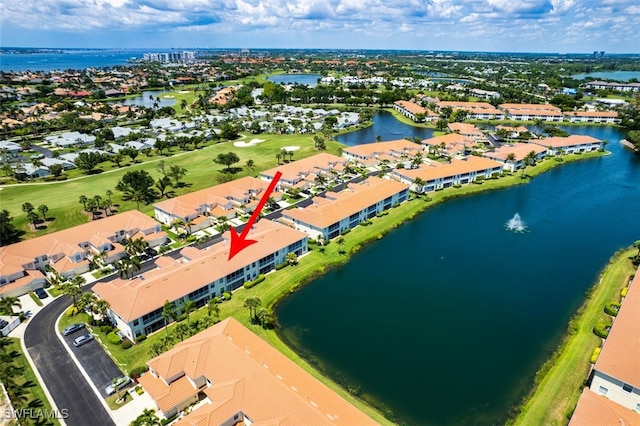 15055 Tamarind Cay Ct Unit 1205, Fort Myers, FL 33908 - aerial perspective of suburban area featuring a large body of water and a golf club