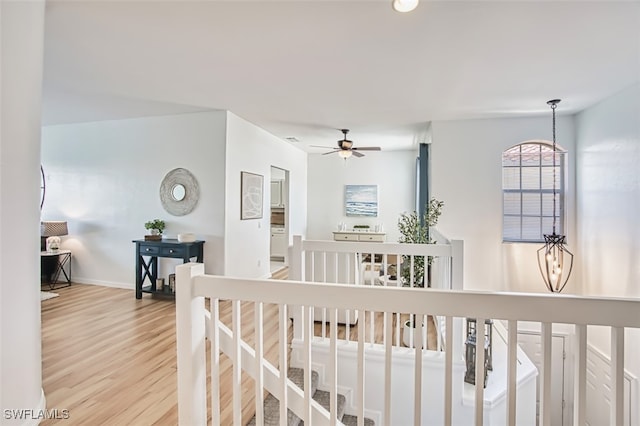 15055 Tamarind Cay Ct Unit 1205, Fort Myers, FL 33908 - corridor featuring wood finished floors and baseboards