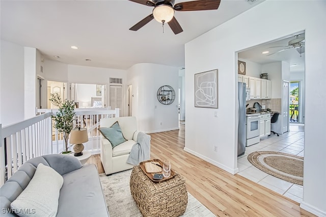 15055 Tamarind Cay Ct Unit 1205, Fort Myers, FL 33908 - living area featuring a ceiling fan, light wood-type flooring, recessed lighting, and baseboards