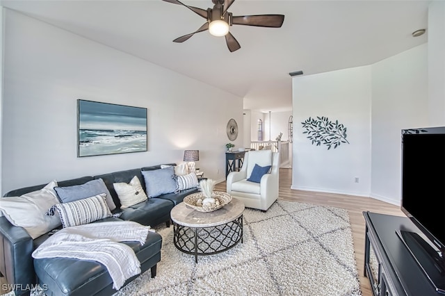 15055 Tamarind Cay Ct Unit 1205, Fort Myers, FL 33908 - living room featuring wood finished floors, a ceiling fan, and baseboards