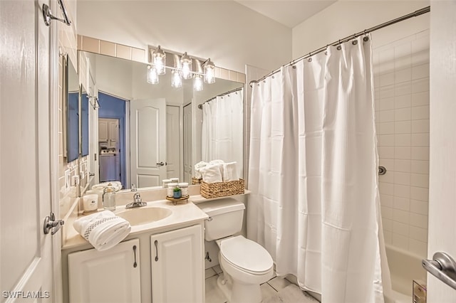 15055 Tamarind Cay Ct Unit 1205, Fort Myers, FL 33908 - full bathroom featuring vanity, toilet, and shower / tub combo with curtain