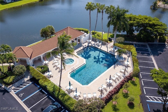 15055 Tamarind Cay Ct Unit 1205, Fort Myers, FL 33908 - drone / aerial view of a pool area and a nearby body of water