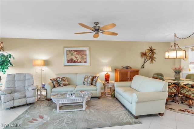 991 N Barfield Dr Unit 110, Marco Island, FL 34145 - living room featuring a ceiling fan and light tile patterned floors