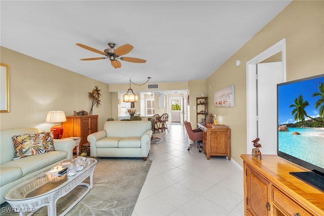991 N Barfield Dr Unit 110, Marco Island, FL 34145 - living area with ceiling fan, light tile patterned floors, and baseboards