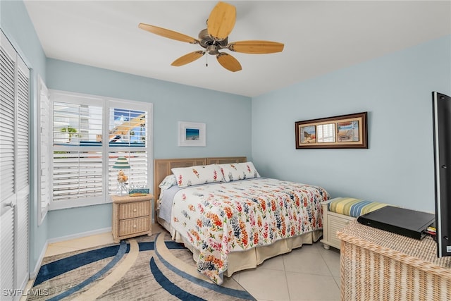 991 N Barfield Dr Unit 110, Marco Island, FL 34145 - tiled bedroom with a closet, ceiling fan, and baseboards