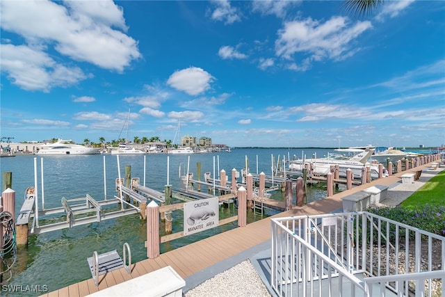 991 N Barfield Dr Unit 110, Marco Island, FL 34145 - dock with boat lift and a water view