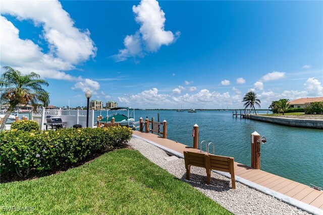 991 N Barfield Dr Unit 110, Marco Island, FL 34145 - dock area featuring a water view