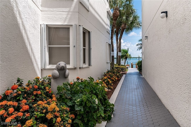 991 N Barfield Dr Unit 110, Marco Island, FL 34145 - view of side of home with stucco siding