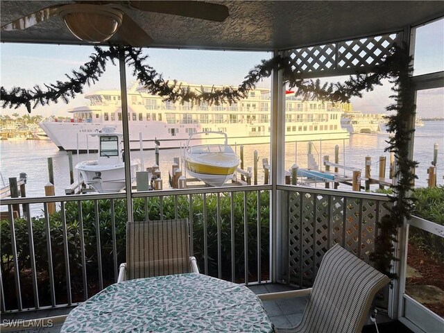 991 N Barfield Dr Unit 110, Marco Island, FL 34145 - balcony with a water view, boat lift, and a dock