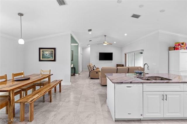 1187 16th Ave NE, Naples, FL 34120 - kitchen with a sink, white dishwasher, vaulted ceiling, light marble finish floors, and light stone countertops