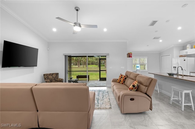 1187 16th Ave NE, Naples, FL 34120 - living room featuring crown molding, ceiling fan, recessed lighting, and baseboards