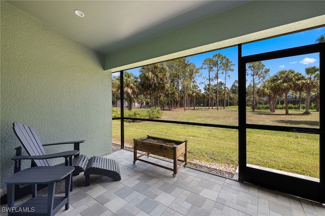 1187 16th Ave NE, Naples, FL 34120 - sunroom / solarium featuring lofted ceiling