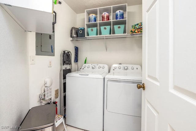 6900 Huntington Lakes Cir Unit 102, Naples, FL 34119 - laundry room featuring washing machine and clothes dryer