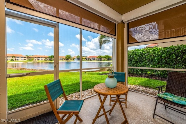 6900 Huntington Lakes Cir Unit 102, Naples, FL 34119 - sunroom with a water view and a residential view