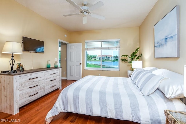 6900 Huntington Lakes Cir Unit 102, Naples, FL 34119 - bedroom with wood finished floors and a ceiling fan