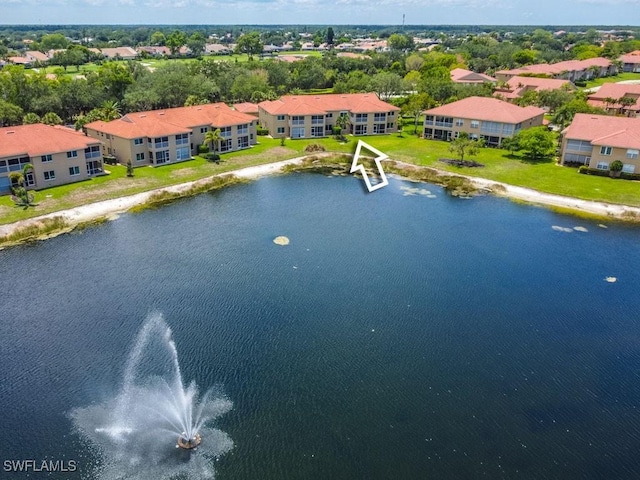 6900 Huntington Lakes Cir Unit 102, Naples, FL 34119 - bird's eye view of a nearby body of water and a tree filled landscape
