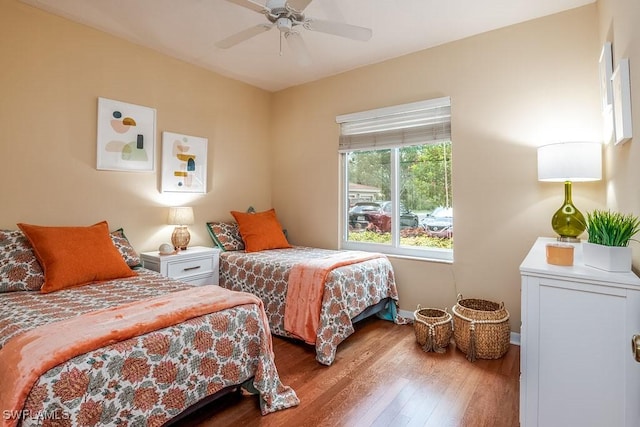 6900 Huntington Lakes Cir Unit 102, Naples, FL 34119 - bedroom featuring wood finished floors, baseboards, and ceiling fan