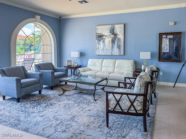6900 Huntington Lakes Cir Unit 102, Naples, FL 34119 - living area featuring crown molding, baseboards, and light tile patterned floors