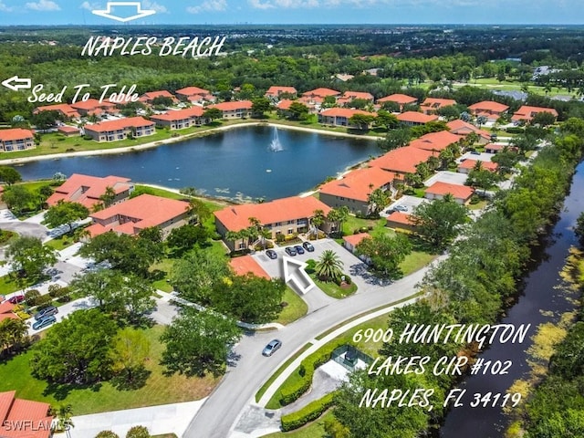6900 Huntington Lakes Cir Unit 102, Naples, FL 34119 - aerial view of property and surrounding area featuring nearby suburban area and a nearby body of water