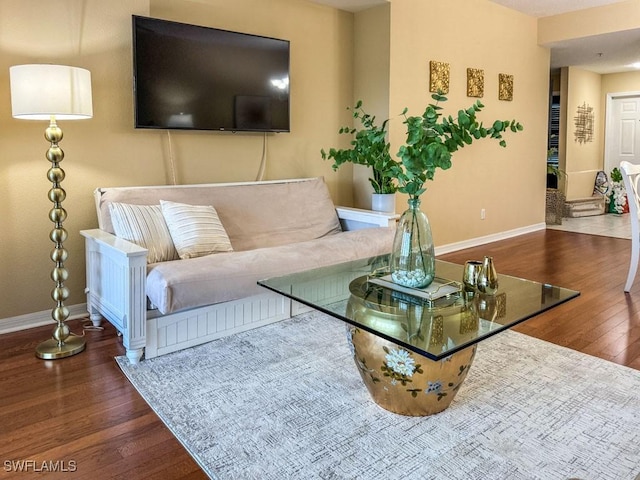 6900 Huntington Lakes Cir Unit 102, Naples, FL 34119 - living area with baseboards and wood finished floors