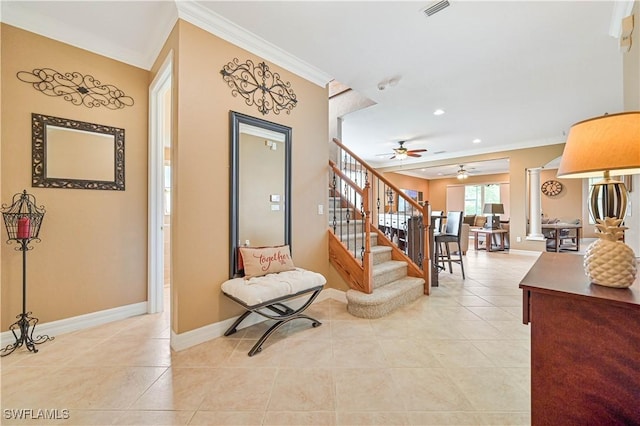 10212 Mimosa Silk Dr, Fort Myers, FL 33913 - entrance foyer featuring crown molding, ceiling fan, light tile patterned floors, baseboards, and stairway