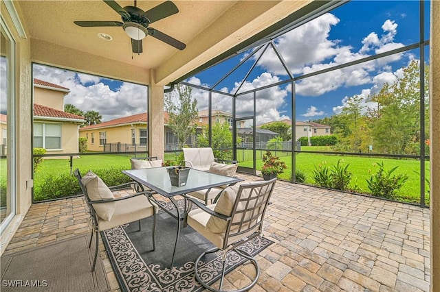 10212 Mimosa Silk Dr, Fort Myers, FL 33913 - view of patio / terrace featuring outdoor dining space, a ceiling fan, a lanai, and a residential view