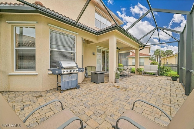 10212 Mimosa Silk Dr, Fort Myers, FL 33913 - view of patio with a grill, ceiling fan, a lanai, and outdoor dining space