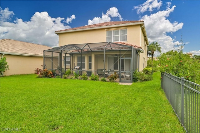 10212 Mimosa Silk Dr, Fort Myers, FL 33913 - rear view of house featuring a tiled roof, stucco siding, and a lanai