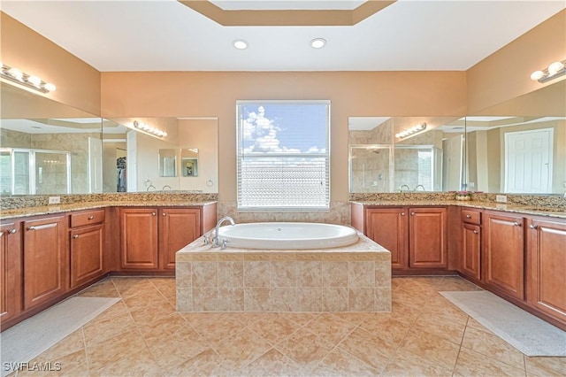 10212 Mimosa Silk Dr, Fort Myers, FL 33913 - full bath featuring a shower stall, two vanities, tile patterned floors, and recessed lighting