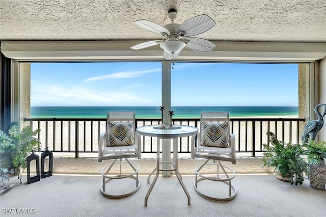 100 N Collier Blvd Unit 1002, Marco Island, FL 34145 - balcony with a water view and ceiling fan