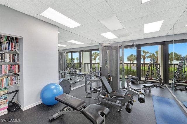 100 N Collier Blvd Unit 1002, Marco Island, FL 34145 - exercise room featuring a drop ceiling and baseboards