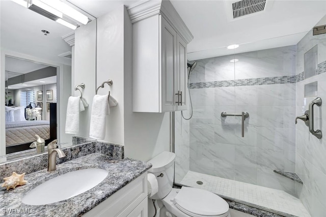 100 N Collier Blvd Unit 1002, Marco Island, FL 34145 - bathroom with a shower stall, vanity, ensuite bathroom, and toilet