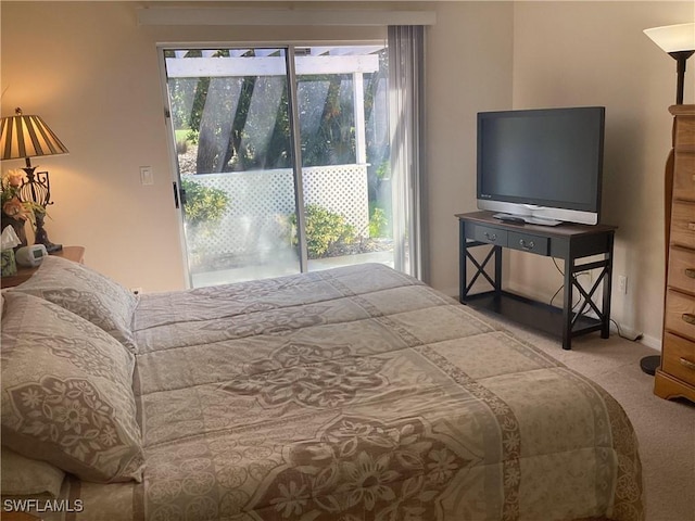 14598 Sagamore Ct, Fort Myers, FL 33908 - carpeted bedroom featuring access to exterior