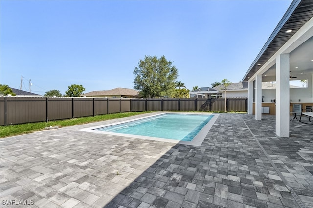224 NW 14th Pl, Cape Coral, FL 33993 - view of pool featuring a patio and a fenced backyard